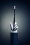 High contrast image of magician hand with magic wand