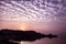 High cumulus cloud, gradient sky and lake at sunrise