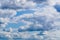 High detail fluffy clouds on blue sky background