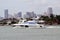 High-End Cabin Cruiser with background of Miami Tall Building Skyline