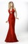High Fashion. Shapely Blonde in Silk Evening Red Gown. Femininity