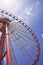 high ferris wheel on blue sky background