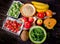 High Fiber Foods on a dark wooden table.