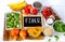 High Fiber Foods on a white wooden background.