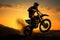 High flying motocross Front wheel raised in silhouette, an action spectacle