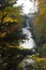 High Force Waterfall on the River Tees and autumn trees, UK