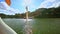 High Fountain on Wide Lake Water Ripple Forestry Bank in Park