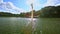 High Fountain on Wide Lake Water Ripple Forestry Bank in Park