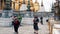 High golden stupa and walking tourists in Wat Phra Kaew