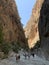 A high gorge of rocks and a mountain river. Deep narrow canyon along the river. Sights of Turkey, excursion for tourists.