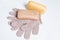 High-grade natural aroma soaps with washing mitten at wite background