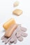 High-grade natural aroma soaps with washing mitten at wite background