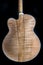 A high grade piece of flamed tiger stripe maple with vivid grain on a guitar