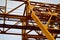 High heavy yellow metal iron load-bearing construction stationary industrial powerful gantry crane of bridge type on supports