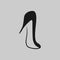 High heel shoe symbol on gray backdrop