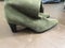 High heeled green suede boots