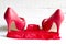 High heels and red g-string abstract concept