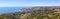 High hillside view of coastline of Laguna Beach with the ocean