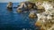 High inaccessible coastal cliffs made of shell rock near the village of Tyulenovo, southern Bulgaria