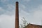 High industry chimney with blue sky