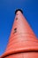 High lighthouse of IJmuiden against a deep blue sky