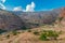 High majestic cliffs and blue sky with clouds