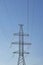 High metal tower. Power line with conductors, withstand surges due to switching lightning