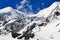 High mountain glacier and snow peaks and slopes