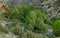 High mountain landscape with meandering river and green pines, Hoces del Riaza, Spain