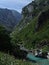 High mountain landscape with river in a beautiful emerald tone, Ruta del Cares, Asturias, Spain