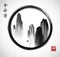High mountains in black enso zen circle on white background. Flying mountains of China. Contains hieroglyphs - peace