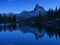 High mountains and reflection on the surface of the lake. Lago Federa, Dolomite Alps, Italy. Landscape at the night.