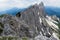 High mountains slope near limestone peak