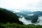 The high mountains tropical forest with clouds passing in India.