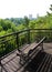 High patio and chair with a view