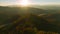 High point of view of highway route in North Carolina through Appalachian mountains in golden fall season with fast