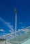 High pole Spotlight Stadium lights with blue sky background