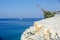 High Precipitous rocks of the black sea coast of Russia. In the background, the Gelendzhik lighthouse.