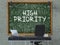 High Priority on Chalkboard with Doodle Icons. 3D.