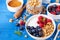 High protein and diet breakfast. Homemade granola crisp with raspberry, blueberry and greek yogurt