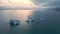 A high quality 4K footage of the Glacier Lagoon Jokulsarlon in Iceland during the golden hour at colorful sunset lights