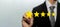 High quality. business man customer hand pointing on five star button on visual screen to review good rating, digital marketing, g