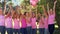 In high quality format smiling women in pink for breast cancer awareness