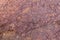 High res close up of dark purple semi smooth natural stone texture background