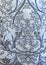 High res elegant pale white intricate hand stitched floral designs vintage victorian fabric wallpaper background extreme close up