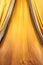 High res elegant vibrant golden yellow historical bed drapery vintage fabric wallpaper background close up