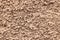 High res extreme close up grunge crowded unfinished pale beige concrete wall