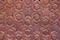 High res intricate arabesque intense red wood egyptian relief extreme close up decorated panel