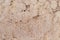 High res old grunge and weathered pale light pink stone wall texture background extreme close up