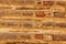 high res of a pale, smooth multi earth tone horizontal brick and wood wall in Egypt